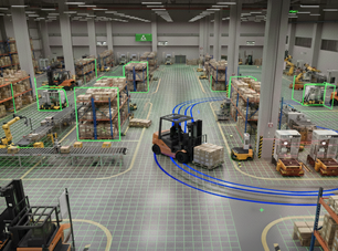 A person in a white outfit sits on a round stool in a spacious, minimalist room. The wall is covered with framed photos surrounding a large screen, creating a serene, contemplative atmosphere